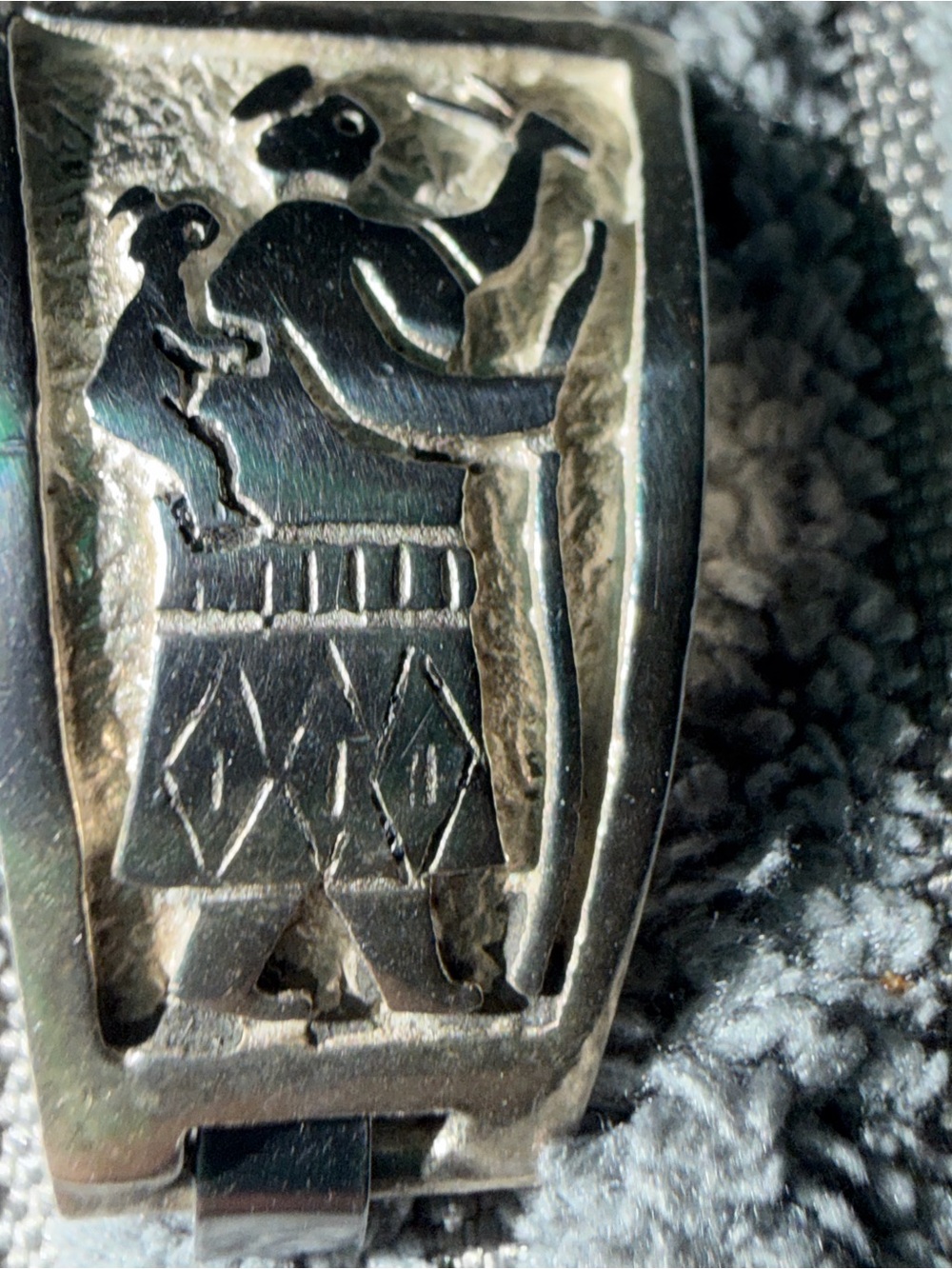 Silver-Tone Women's Bracelet Watch with Etched Tribal Motif it’s silver